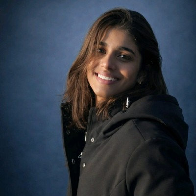 Customer portrait: woman in a dark coat